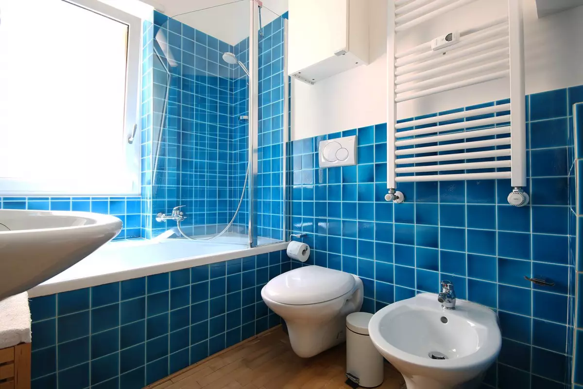 QUADRILOCALE CON DOPPI SERVIZI E POSTO AUTO COPERTO E CANTINA